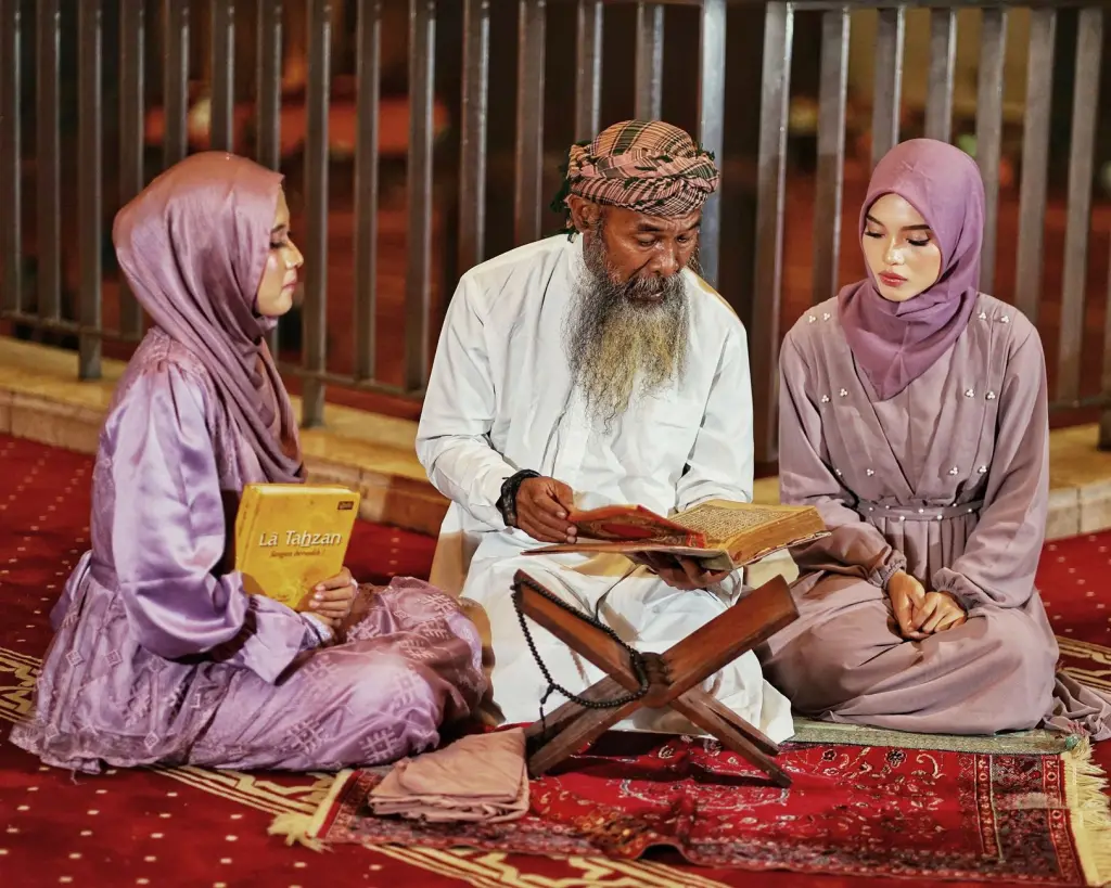 A group engaging in a cultural study session inside a mosque in Jakarta, Indonesia.